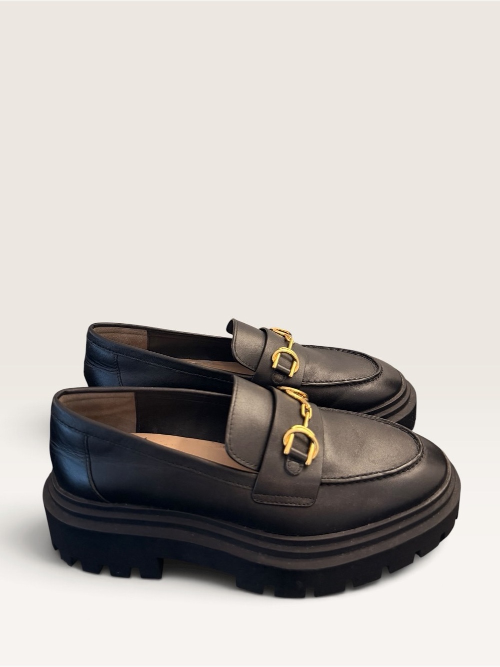 Stuart Weitzman Black Leather Lug-Sole Loafers with Gold Horsebit